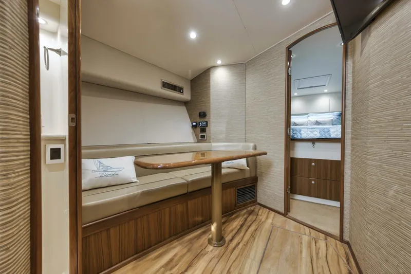 Blondie Yacht Photos Pics Interior of 2012 Viking 42 Open yacht with elegant seating and wooden finishes.