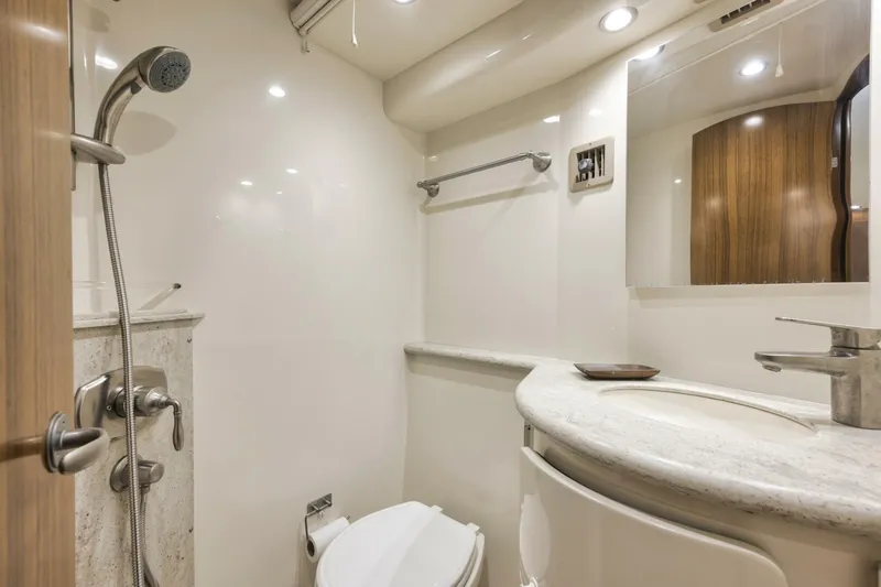 Blondie Yacht Photos Pics Luxurious bathroom in 2012 Viking 42 Open yacht with modern fixtures and elegant design.
