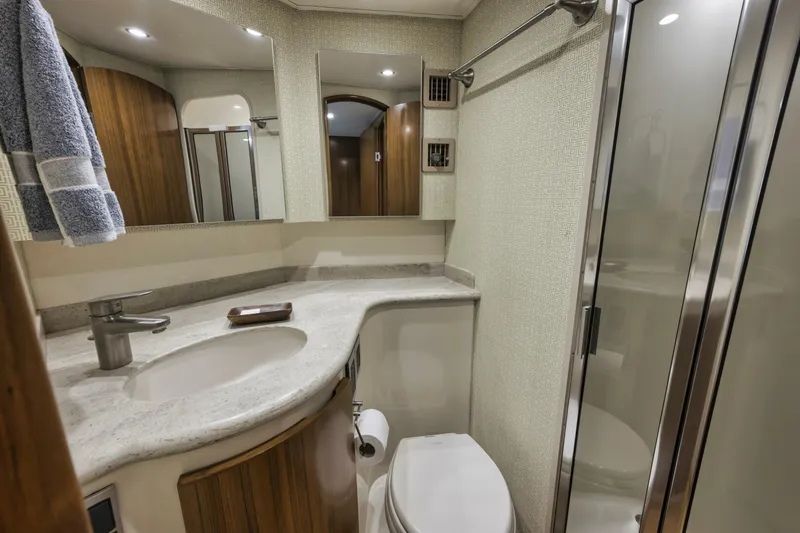 Blondie Yacht Photos Pics Luxurious bathroom in 2012 Viking 42 Open yacht with modern fixtures and elegant design.