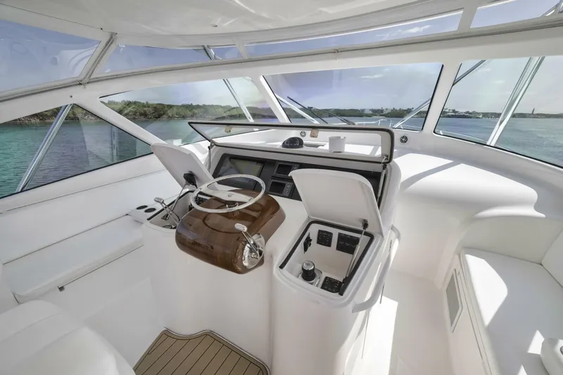 Blondie Yacht Photos Pics 2012 Viking 42 Open yacht helm with modern controls and panoramic windows.