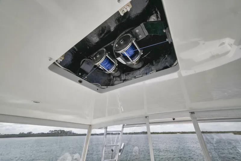 Blondie Yacht Photos Pics 2012 Viking 42 Open boat interior with fishing rod holders on the ceiling.
