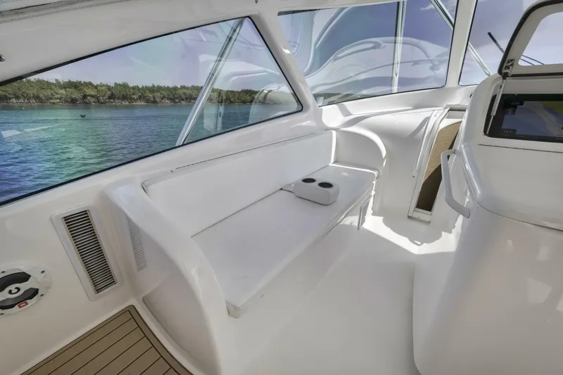 Blondie Yacht Photos Pics 2012 Viking 42 Open yacht interior with white seating and ocean view.