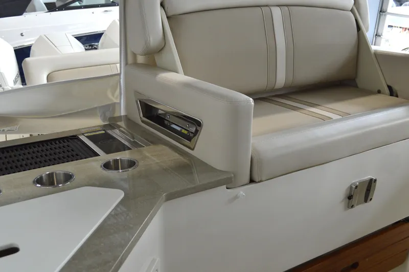  Yacht Photos Pics 2024 Boston Whaler 350 Realm interior with luxurious seating and sleek design.