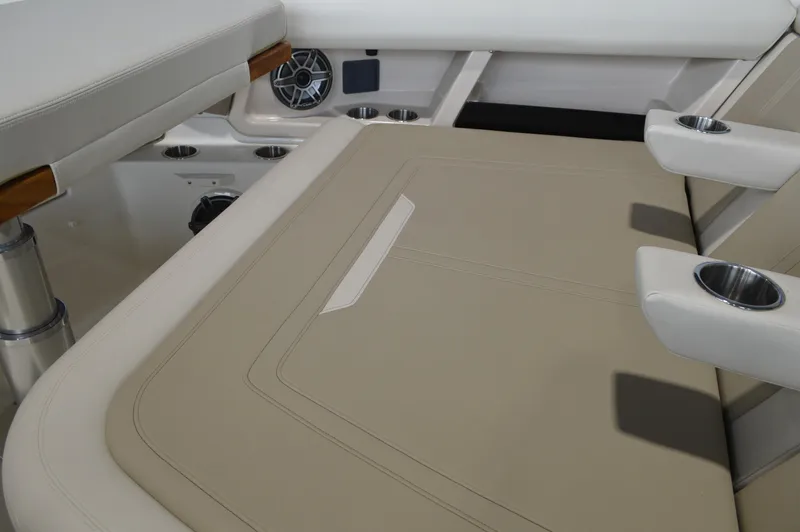  Yacht Photos Pics 2024 Boston Whaler 350 Realm interior seating with cup holders and speaker.