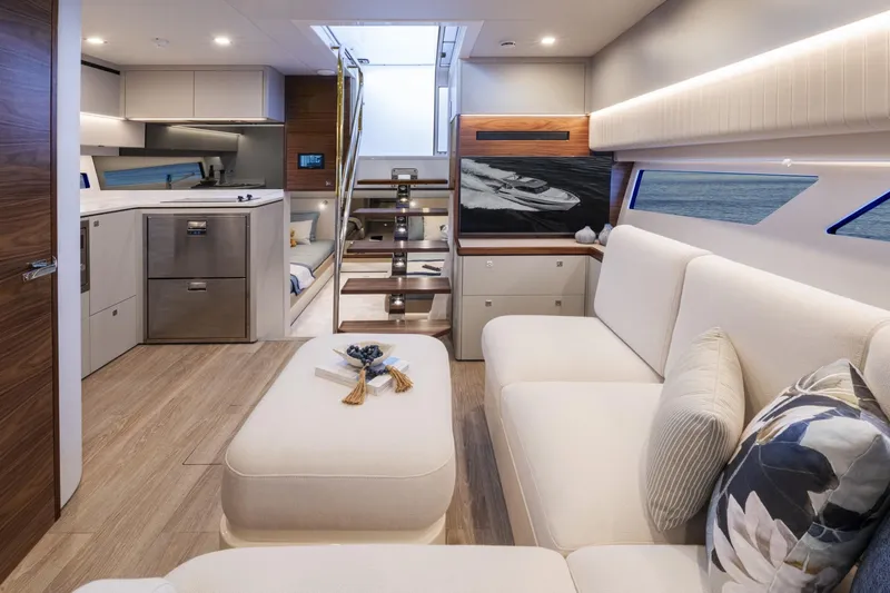  Yacht Photos Pics Luxurious interior of 2025 Riviera 4300 yacht with modern design and elegant furnishings.