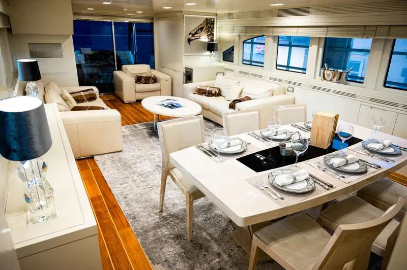  Yacht Photos Pics Luxurious interior of 2010 Benetti Sail Division 90 yacht with elegant dining and seating areas.