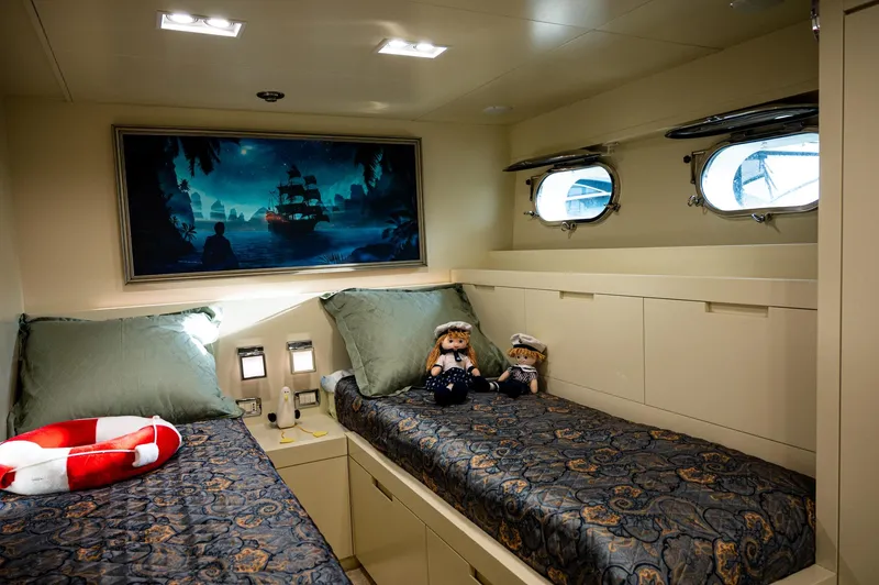  Yacht Photos Pics Cozy cabin with twin beds on 2010 Benetti Sail Division 90 yacht.