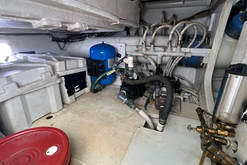 Dream On Yacht Photos Pics Engine room of a 2005 Bertram 450 yacht with hoses and equipment.