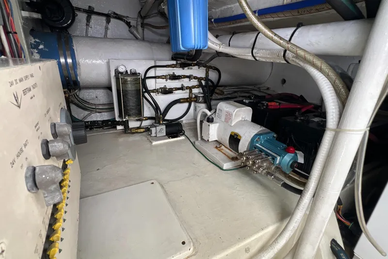 Dream On Yacht Photos Pics Engine room of a 2005 Bertram 450 yacht, showcasing mechanical components and wiring.