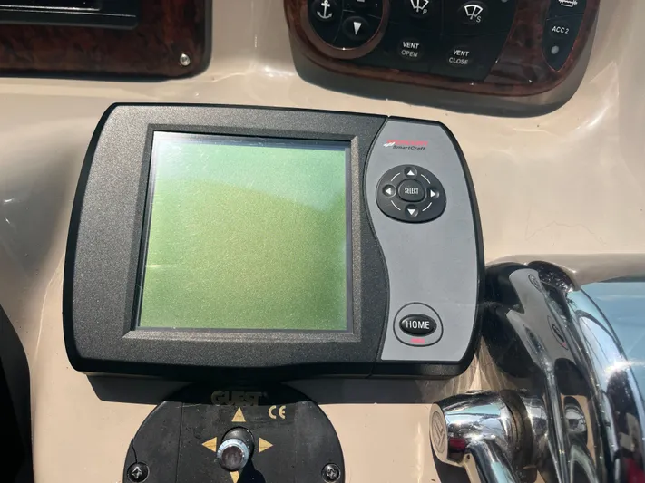  Yacht Photos Pics Control panel on a 2006 Sea Ray 320 Sundancer boat dashboard.