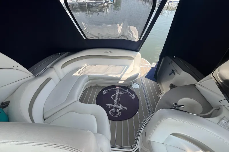  Yacht Photos Pics Interior of 2006 Sea Ray 320 Sundancer boat with seating and nautical decor.