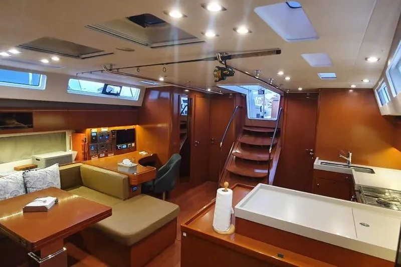 Mareo Yacht Photos Pics Luxurious interior of 2018 Beneteau Oceanis 55.1 yacht with modern amenities and elegant design.