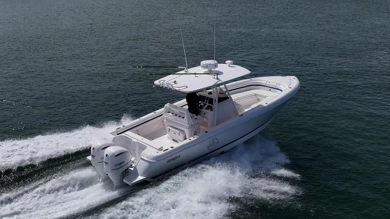 Christyl Clear Yacht Photos Pics 2018 Intrepid 327 Center Console boat cruising on open water.