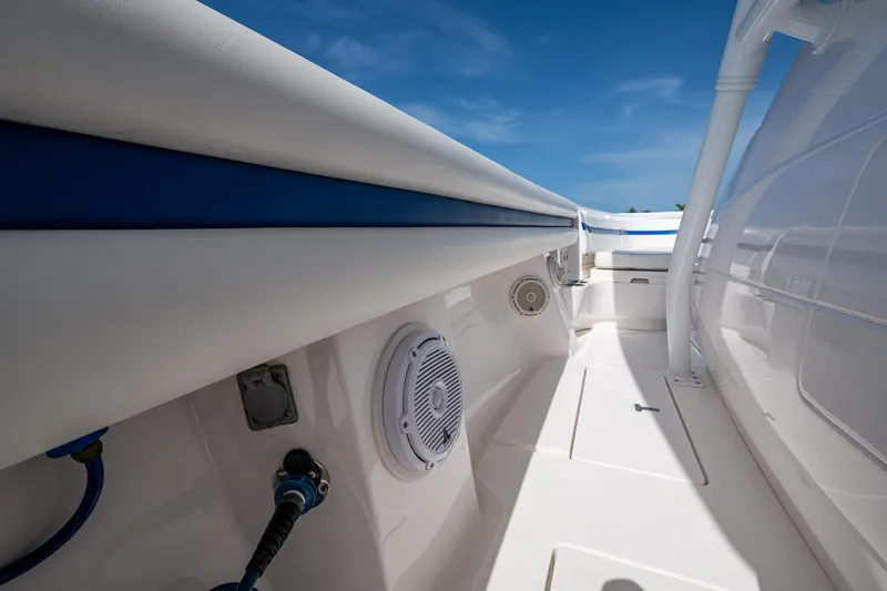 Christyl Clear Yacht Photos Pics 2018 Intrepid 327 Center Console boat interior with white and blue detailing.