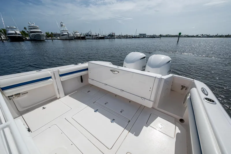 Christyl Clear Yacht Photos Pics 2018 Intrepid 327 Center Console boat with dual engines docked at marina.