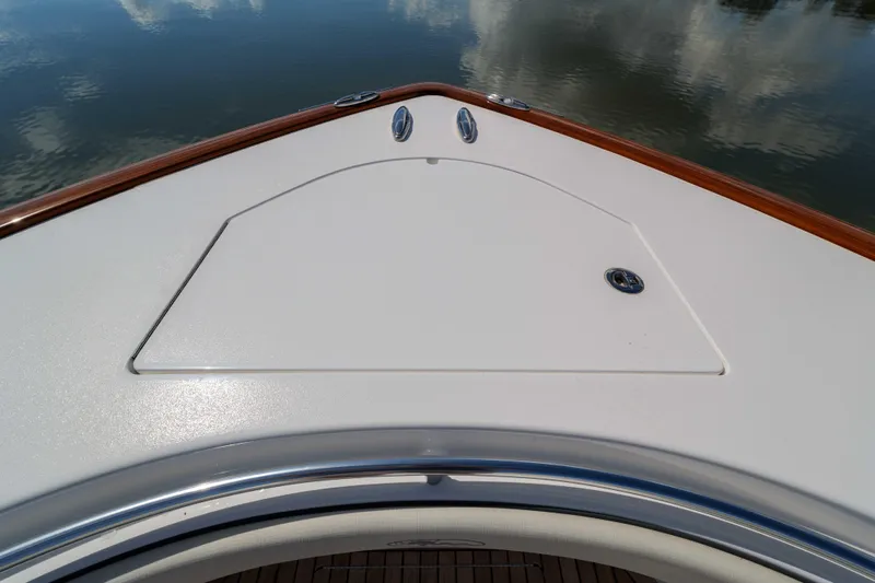 Lucky 24 IV Yacht Photos Pics 2024 Valhalla Boatworks V-55 bow deck with sleek design and wood accents.