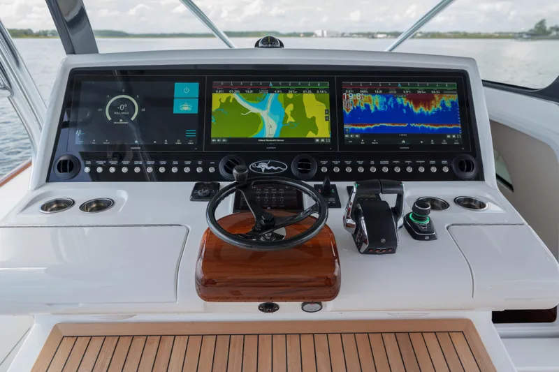 Lucky 24 IV Yacht Photos Pics 2024 Valhalla Boatworks V-55 helm with advanced navigation displays and controls.