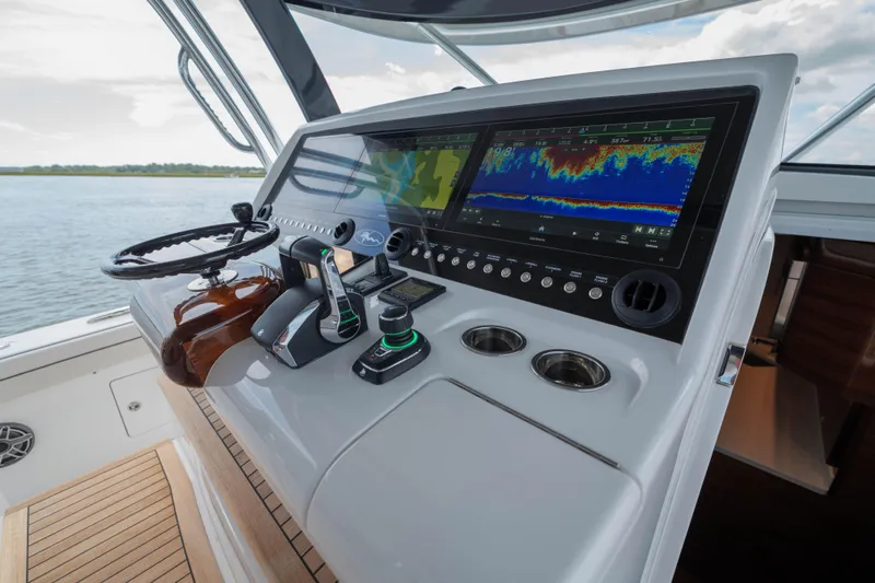 Lucky 24 IV Yacht Photos Pics 2024 Valhalla Boatworks V-55 helm with advanced navigation displays and controls.