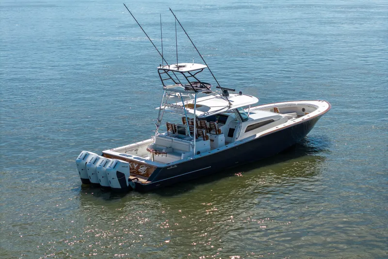 Lucky 24 IV Yacht Photos Pics 2024 Valhalla Boatworks V-55 on water, featuring multiple outboard engines.