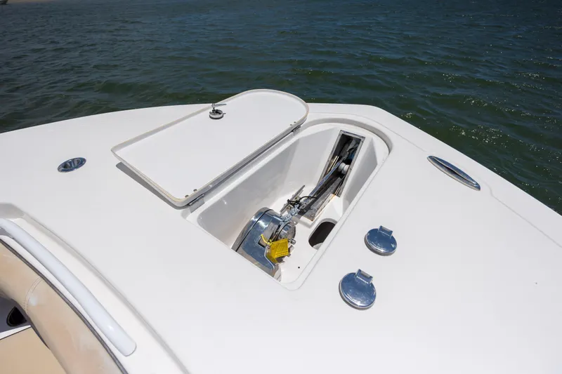 Yacht Photos Pics 2020 Tidewater 320 CC Adventure boat anchor compartment on open water.