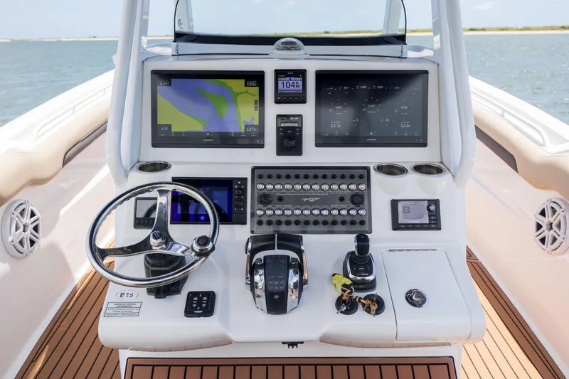  Yacht Photos Pics 2020 Tidewater 320 CC Adventure boat dashboard with advanced navigation and control systems.