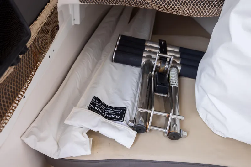  Yacht Photos Pics Storage area in 2020 Tidewater 320 CC Adventure boat with folded equipment and netting.