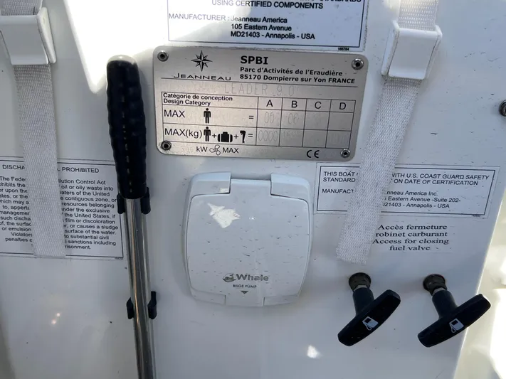  Yacht Photos Pics 2021 Jeanneau Leader 9.0 WA boat control panel with safety instructions and equipment.