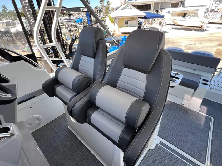  Yacht Photos Pics 2021 Jeanneau Leader 9.0 WA boat seats, featuring modern design and comfort.