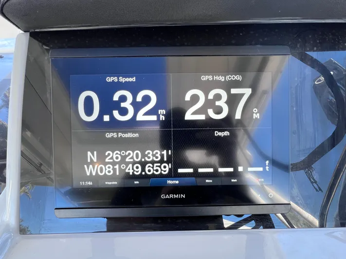  Yacht Photos Pics Garmin GPS display on 2021 Jeanneau Leader 9.0 WA boat, showing speed and coordinates.