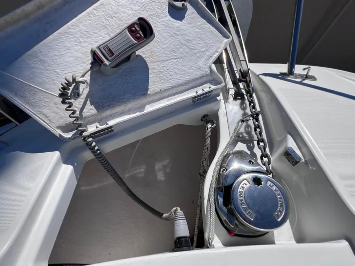  Yacht Photos Pics 2021 Jeanneau Leader 9.0 WA anchor compartment with winch and control panel.