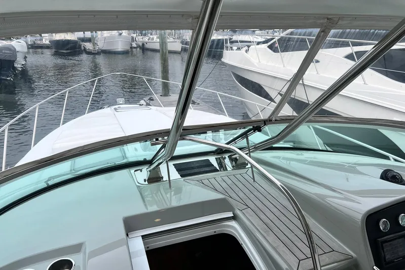 No Worries Yacht Photos Pics 2011 Formula 37 Performance Cruiser at marina, showcasing sleek design and spacious deck.