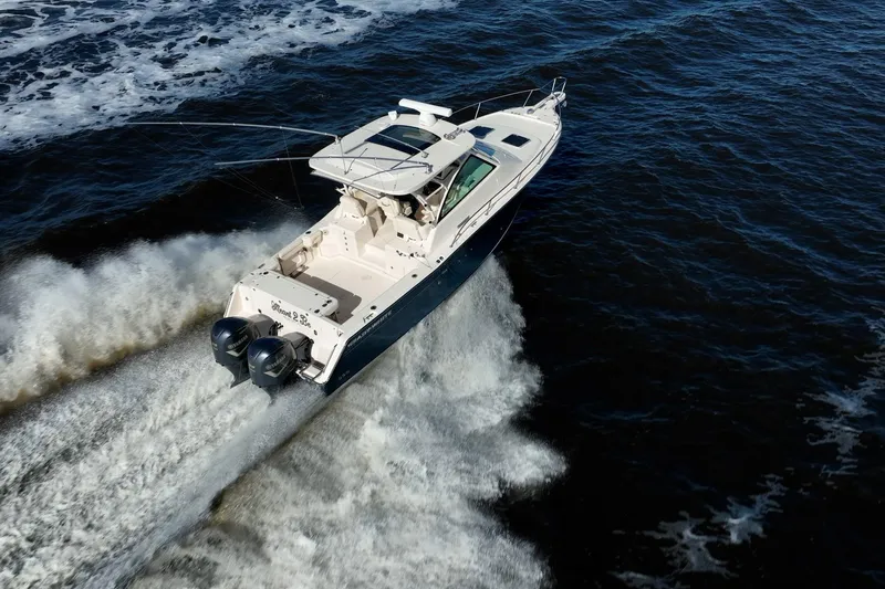 Meant To Be Yacht Photos Pics 2018 Grady-White Express 330 boat cruising on open water, aerial view.