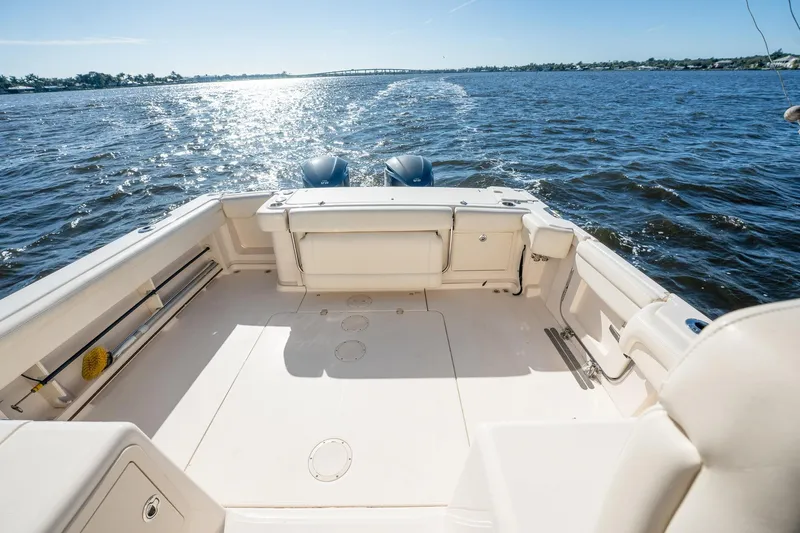 Meant To Be Yacht Photos Pics 2018 Grady-White Express 330 boat deck on open water, sunny day.