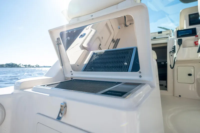 Meant To Be Yacht Photos Pics 2018 Grady-White Express 330 boat interior with open grill, ocean view.