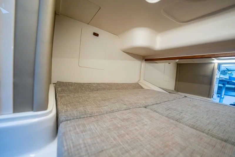 Meant To Be Yacht Photos Pics 2018 Grady-White Express 330 cabin interior with comfortable bedding.