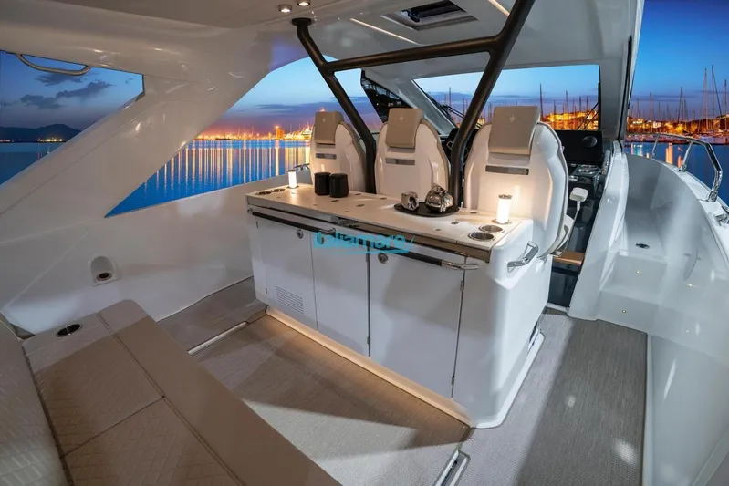  Yacht Photos Pics 2024 Jeanneau DB/37 OB luxury yacht interior with elegant seating and modern design.