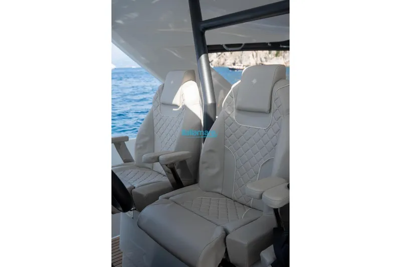  Yacht Photos Pics Luxurious seating on the 2024 Jeanneau DB/37 OB boat, with ocean view.