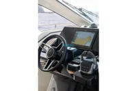 2024 Jeanneau DB/37 OB helm with GPS display and steering wheel.