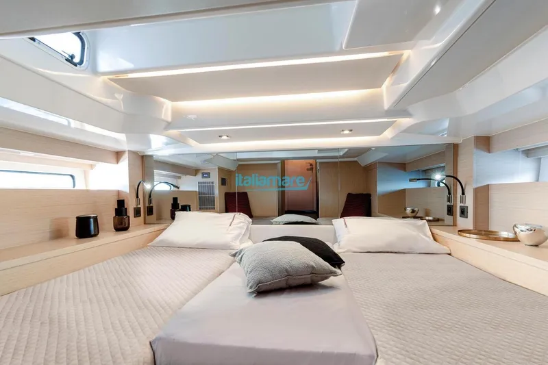  Yacht Photos Pics Luxurious cabin interior of 2024 Jeanneau DB/37 OB yacht with modern design.
