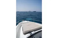 2024 Jeanneau DB/37 OB yacht bow view on open sea.