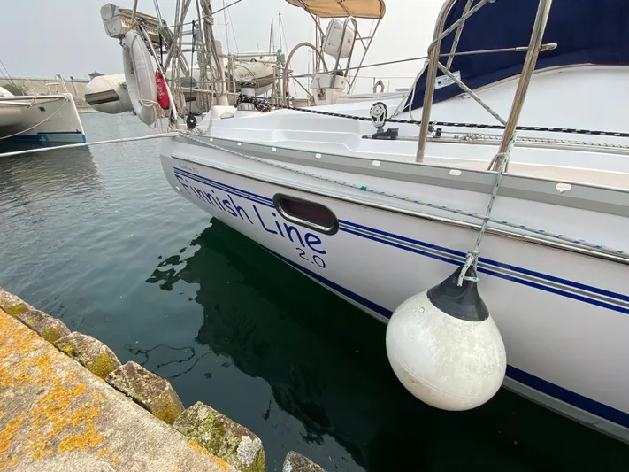  Yacht Photos Pics Catalina 355 sailboat docked, side view with fender, 2014 model.