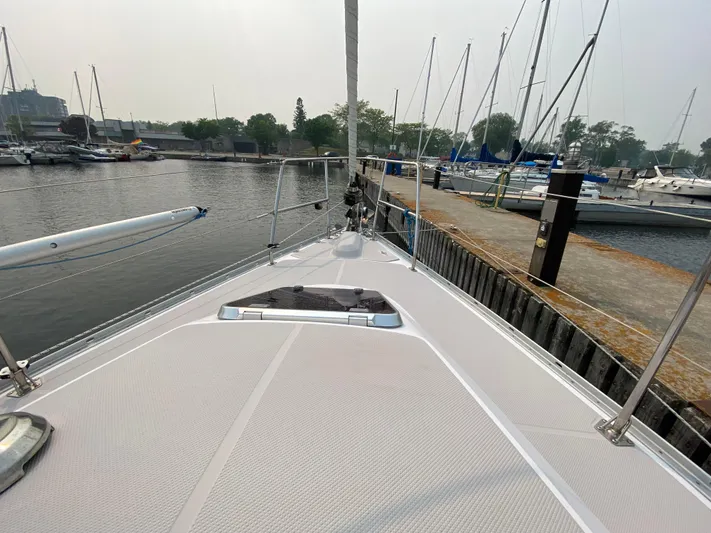  Yacht Photos Pics 2014 Catalina 355 sailboat docked at a marina, view from the deck.