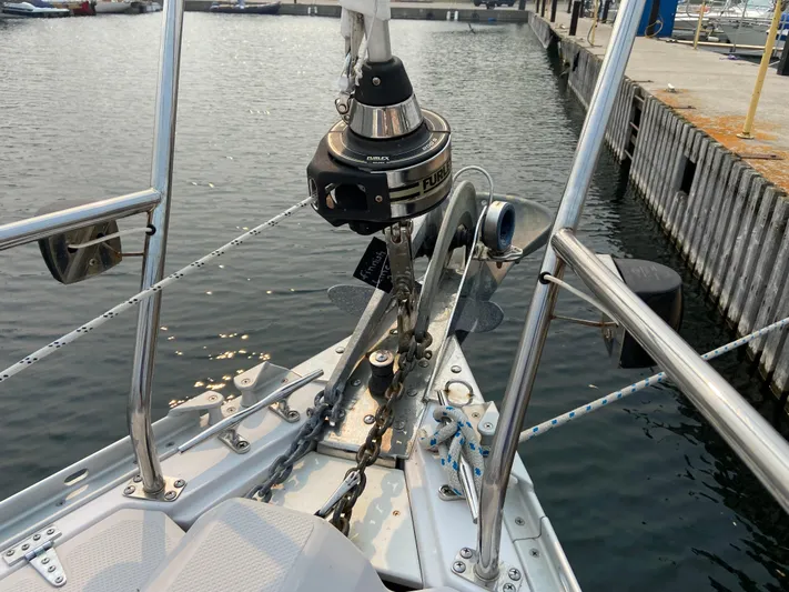  Yacht Photos Pics Bow of 2014 Catalina 355 sailboat with anchor and winch at marina.