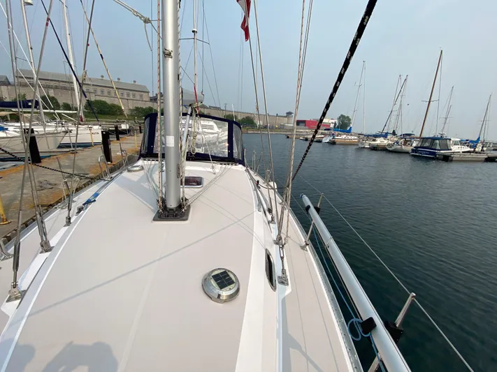  Yacht Photos Pics Sailboat Catalina 355, 2014 model, docked in a marina with clear skies.
