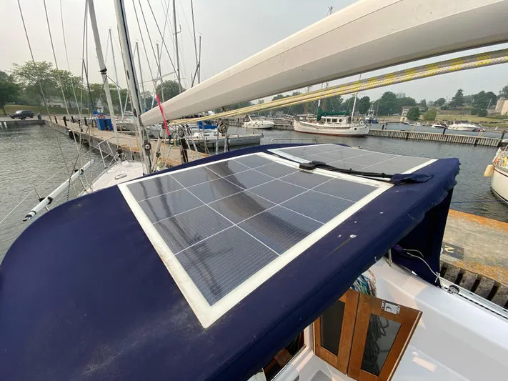  Yacht Photos Pics Catalina 355 sailboat with solar panel, docked at marina, 2014 model.