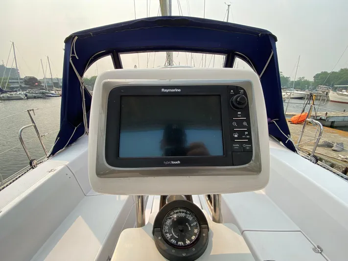  Yacht Photos Pics Cockpit of 2014 Catalina 355 sailboat with navigation equipment and compass.