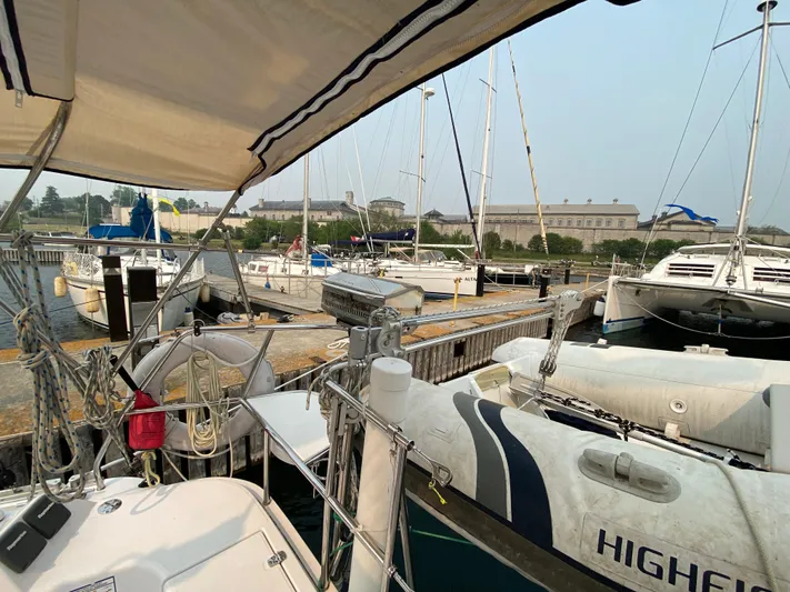  Yacht Photos Pics Catalina 355 sailboat docked at marina, surrounded by other boats, 2014 model.
