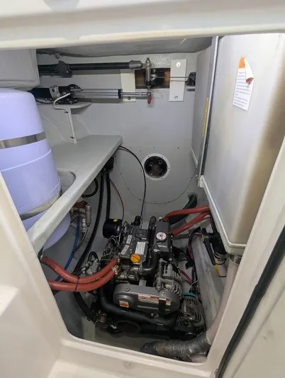 God Speed Yacht Photos Pics Engine compartment of a 2020 Seawind 1260 catamaran, showcasing mechanical components and wiring.