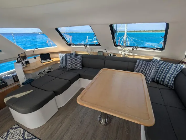 God Speed Yacht Photos Pics Interior of 2020 Seawind 1260 catamaran with modern seating and ocean view.