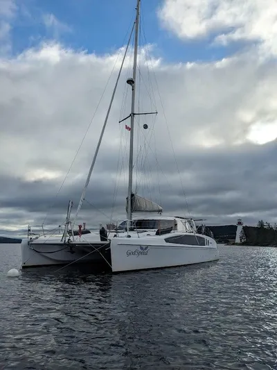 God Speed Yacht Photos Pics 2020 Seawind 1260 catamaran sailing on a cloudy day.